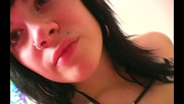 A young tattooed and pierced slut makes a video for her boyfriend