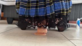 Riding a dildo in a miniskirt