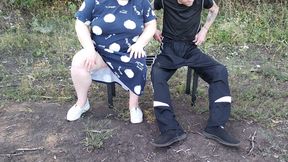 A girlfriend in a public park jerks off my dick until I cum