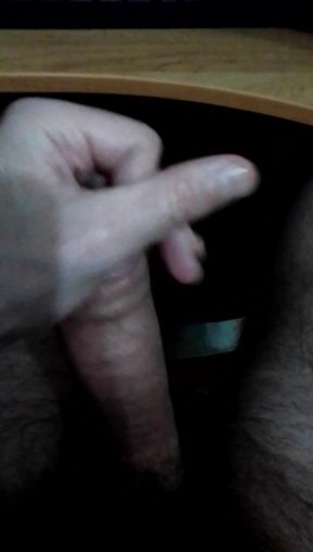 A guy jerks off a dick