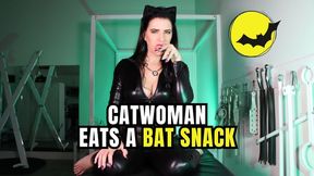 Catwoman Eats A Bat Snack - Mistress Juistine Cross