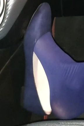 Dangling in Blue Pantyhose and Blue Flats on a Gas Station