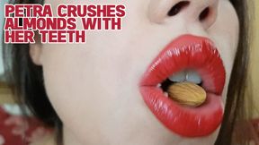 Petra crushes almonds with her teeth - FULLHD