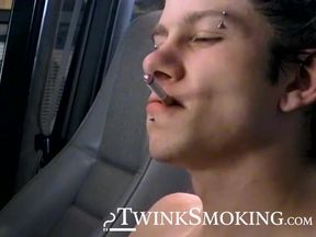 Attractive Ian Madrox is blowing smoke and starts stretching his cock in his smoky jeep