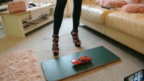 GIANTESS Charn crushes a 1969 Ford Torino in black stiletto high heels left side view