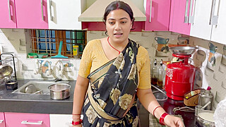 My lovely stepmother was cooking in the kitchen, father went to office then stepmother wants to fuck her. Full Hindi Viral Video