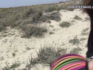 cute eighteen year brunette hair bare at beach