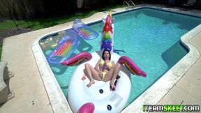 Stud passionately pleasures a petite beauty in a pool, delivering intense satisfaction.