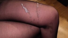 Girl in Pantyhose Gets Cum on Her Feet