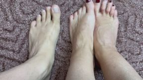 LORY compares her legs to Bob's legs b