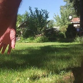 icumoveru gets naked in the backyard and has some risky fun while wearing his hollow butt plug.