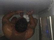 Popular guy sucks big black dick through the public gloryhole
