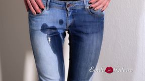 Trans girl pisses in her tight blue jeans