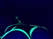 Glowing ebony ass under blacklight