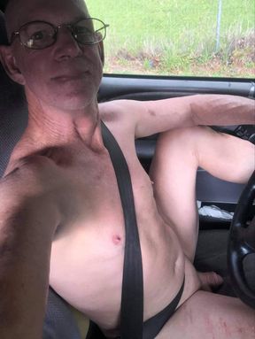 Another naked driving down highway