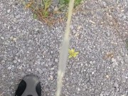 Taking a piss on country road
