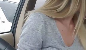 milking her tits in the car
