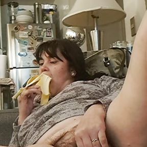 slut milf eats banana from her pussy