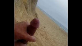 Beach masturbation with cumshot.