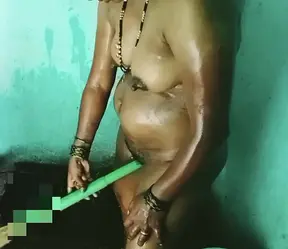 Hot Tamil lady gets it on in the bathroom