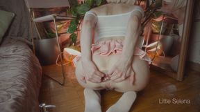 A beautiful girl stretches her ass with a huge toy