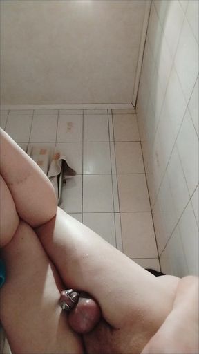 Fast cumshot in chastity cage