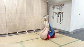HH98-Supergirl was bound and tied up, her hands and feet suspended in mid-air.