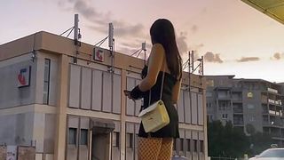 Public walking with fishnet stockings and black dress