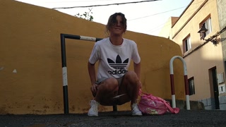 Pretty girl pees in public