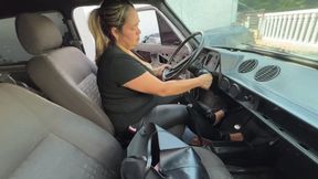 Mrs. Barbara smokes as she starts the car. custom