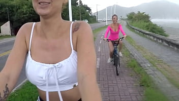 Sexy rider flashes big tits on the bike