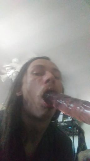 Sissy Mae deepthroats a dildo