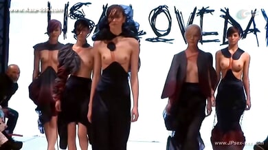 Blonde models strut the runway in sheer lingerie at a bold public fashion show