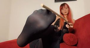 Toes through worn sheer tights