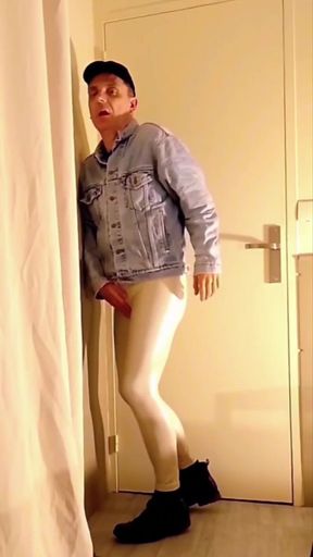 Cock stroking through white vinyl leggings