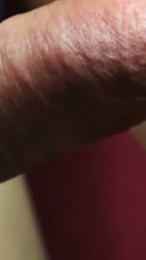 gentle penis massage to the music and inflated red head   Clip 1