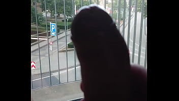 Jerk off at the hotel window