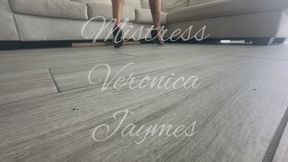 Walking in Gold and Black Heels