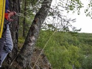 Two tight streams of urine cross in the mountains. Pissing outdoor UHD 4K video
