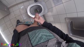 I pee and jerk off my thick, shaved foreskin cock in a motorway toilet.