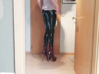 Crossdresser teasing in shiny Leggings and Heels