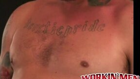”Inked dude tugging on his dick until he cums on his belly”