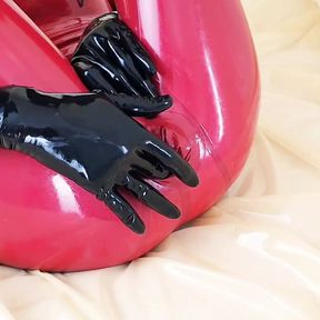 OnlyFans teaser - This is my red latex catsuit with integrated condoms!