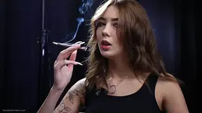 Tattooed Brunette Smokes in Studio Masturbation