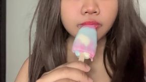 Hot Asian Babe Licks Creamy Scoop with Sensual Sounds