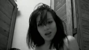 Pregnant Latina teen is dancing n front of a camera