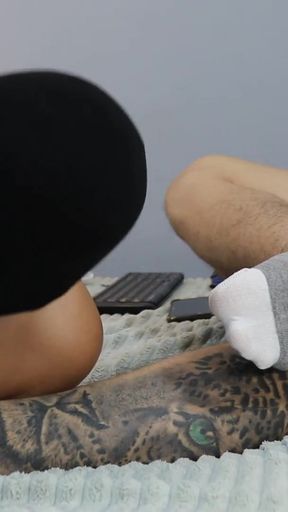 Captivating moment from &quot;He is a fan of smelling my gray and white socks. He says he likes sweaty feet.&quot;