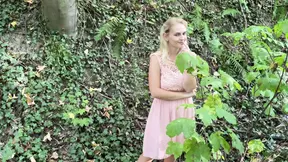 Hot MILF shows off nice boobs in the forest