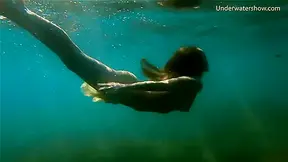 Hot Darling Swims In The Sea Like A Mermaid