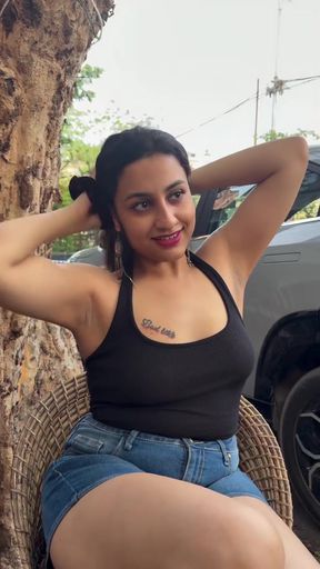 Hottie cute Indian sits and shows off her curvy figure